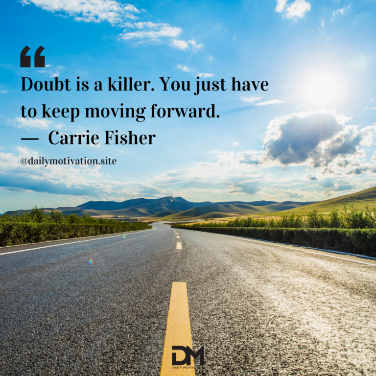 A close up of a highway road with the blue distant sky beyond.