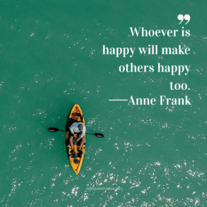 Overhead view of an orange kayak in green water.