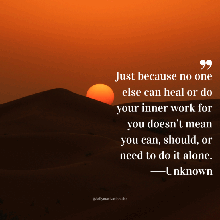 Golden sunset over rolling desert dunes with the sun halfway below the horizon.