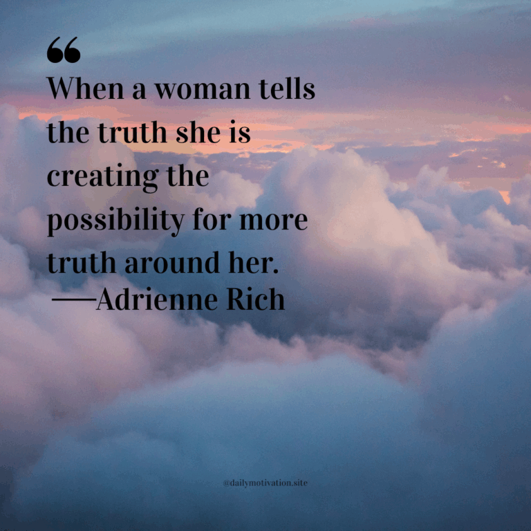 Soft pink and blue clouds floating above a glowing sunset sky.