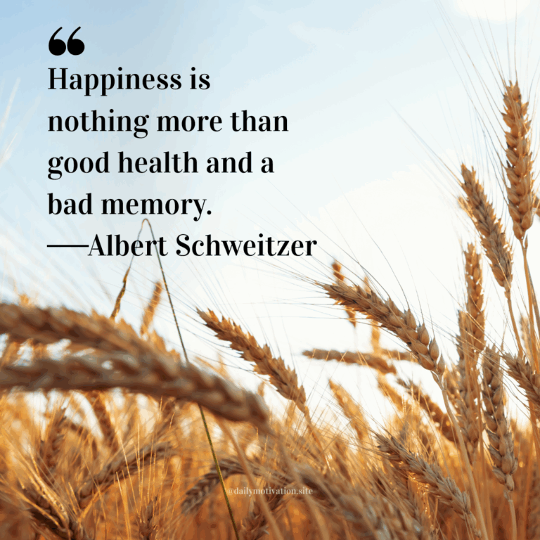 Golden wheat stalks swaying in sunlight against a clear blue sky.