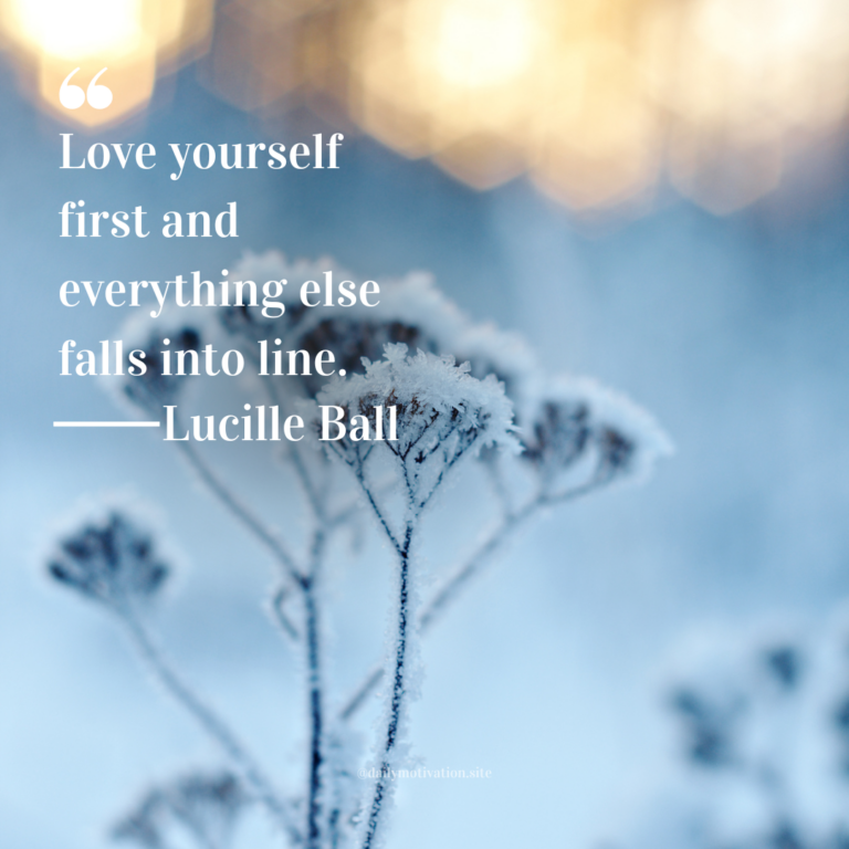 Frost-covered wildflowers standing against a pale blue winter background with soft light.