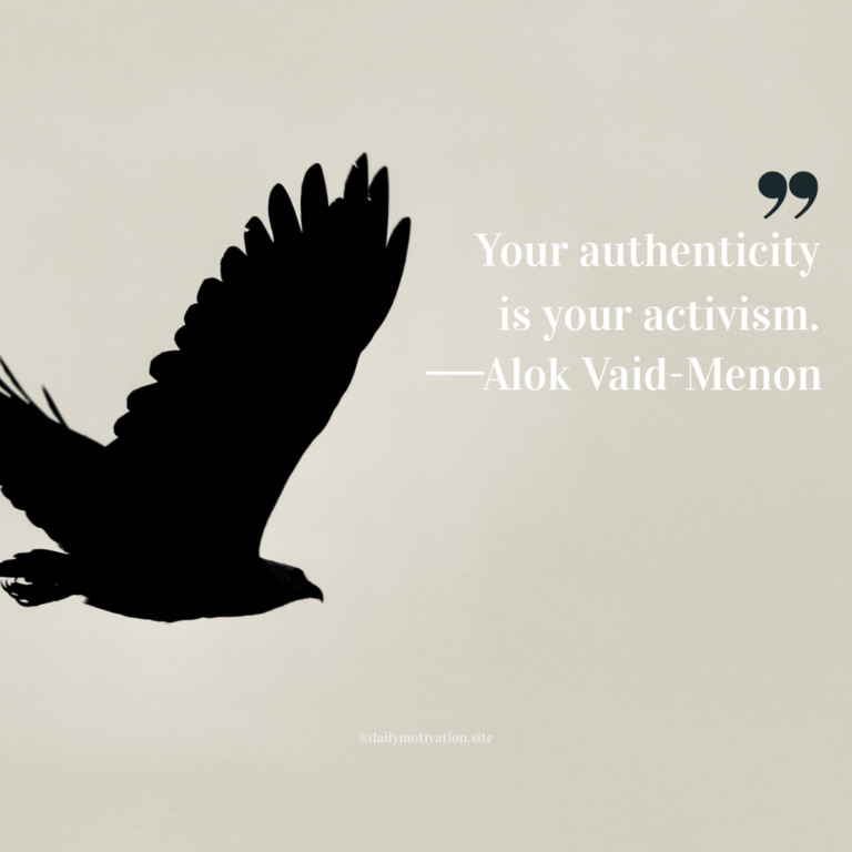 Silhouette of a bird in flight against a pale, neutral sky background.