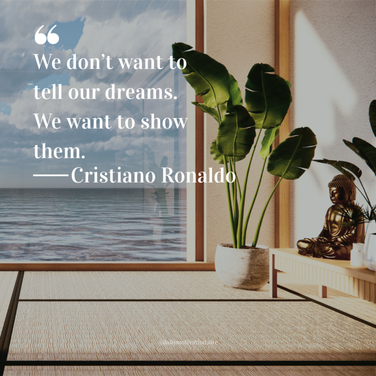 Minimalist interior with a large potted plant, Buddha statue, and ocean view through a wide window.