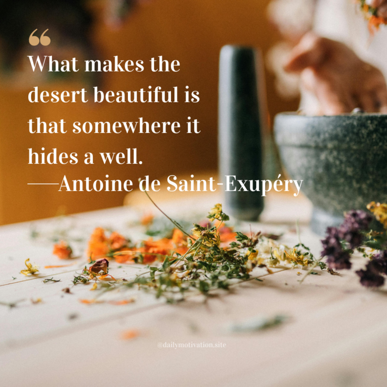 Dried flowers and herbs scattered across a tabletop beside a ceramic mortar and pestle.