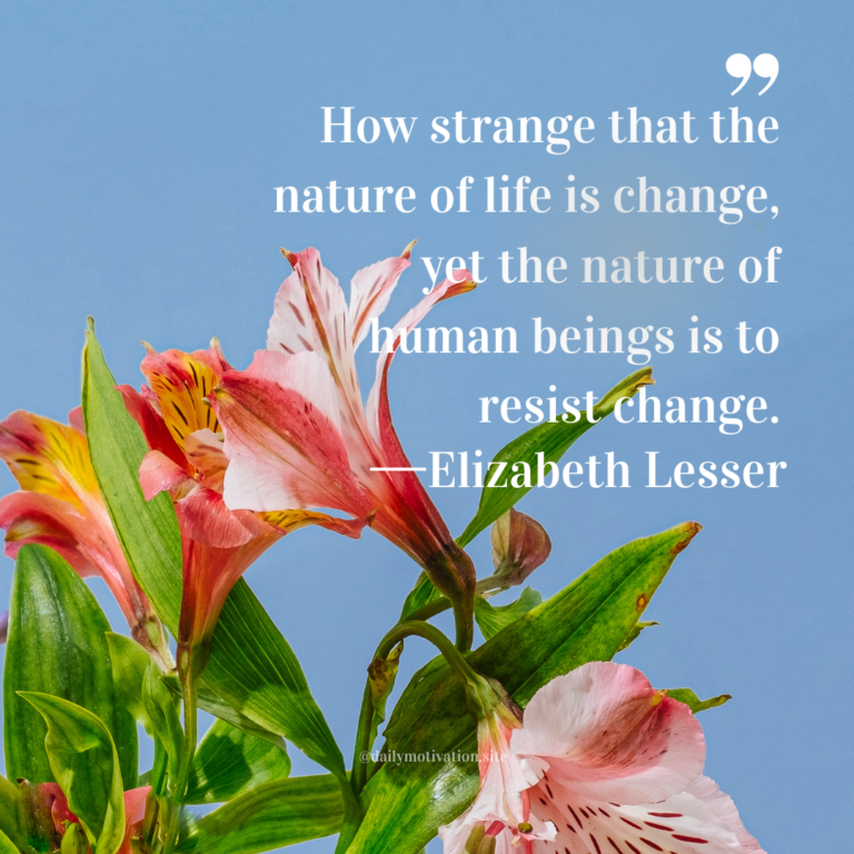 Close-up of pink and coral flowers with green leaves against a clear blue sky in bright natural light.