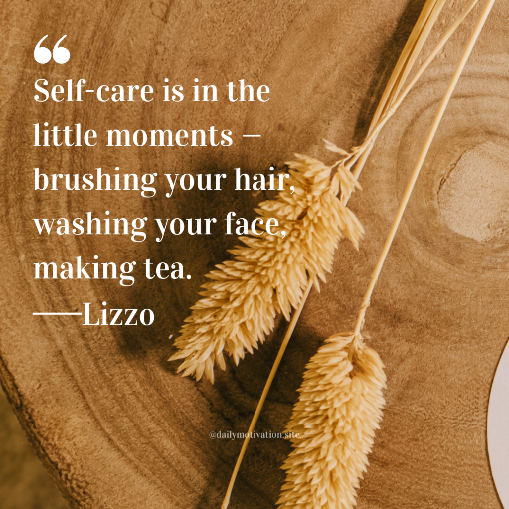 Dried wheat stems arranged on a textured wooden surface in warm earthy tones.