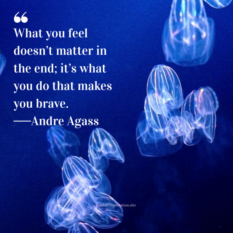 Translucent jellyfish drifting in deep blue water with soft glowing highlights.